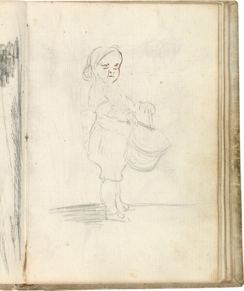 Niño de perfil tocando el tambor