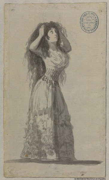 Mujer joven mesándose los cabellos